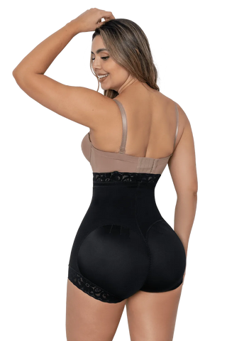 Woman modeling the Black Extra High-Waisted Butt Enhancer Shaper Panty from Jackie London, rear view
