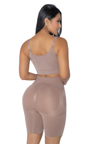Woman modeling the High Waist Seamless Push Up Shorts from Jackie London, rear view