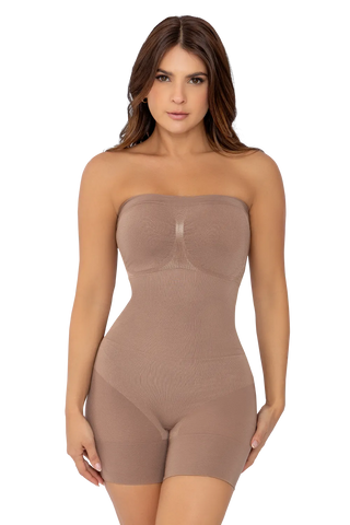 Front view of a woman modeling the Mocha Seamless Strapless Sculpting Bodysuit from Jackie London