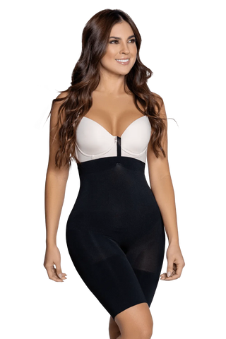Front view of a woman modeling the Black Shorts Seamless Strapless Bodysuit from Jackie London