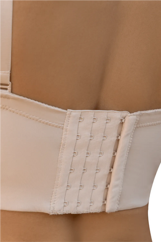 Close-up detail of the Beige Strapless Back Coverage Bra shapewear by Jackie London